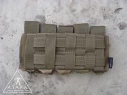 Клипса надежно вплетается в MOLLE слоты подсумка 